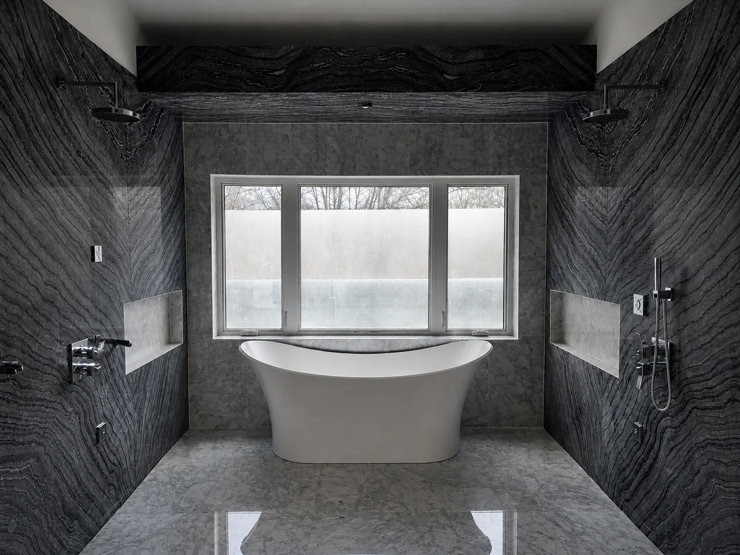 Bookmatched dark stone wet room with freestanding tub and polished tile floor